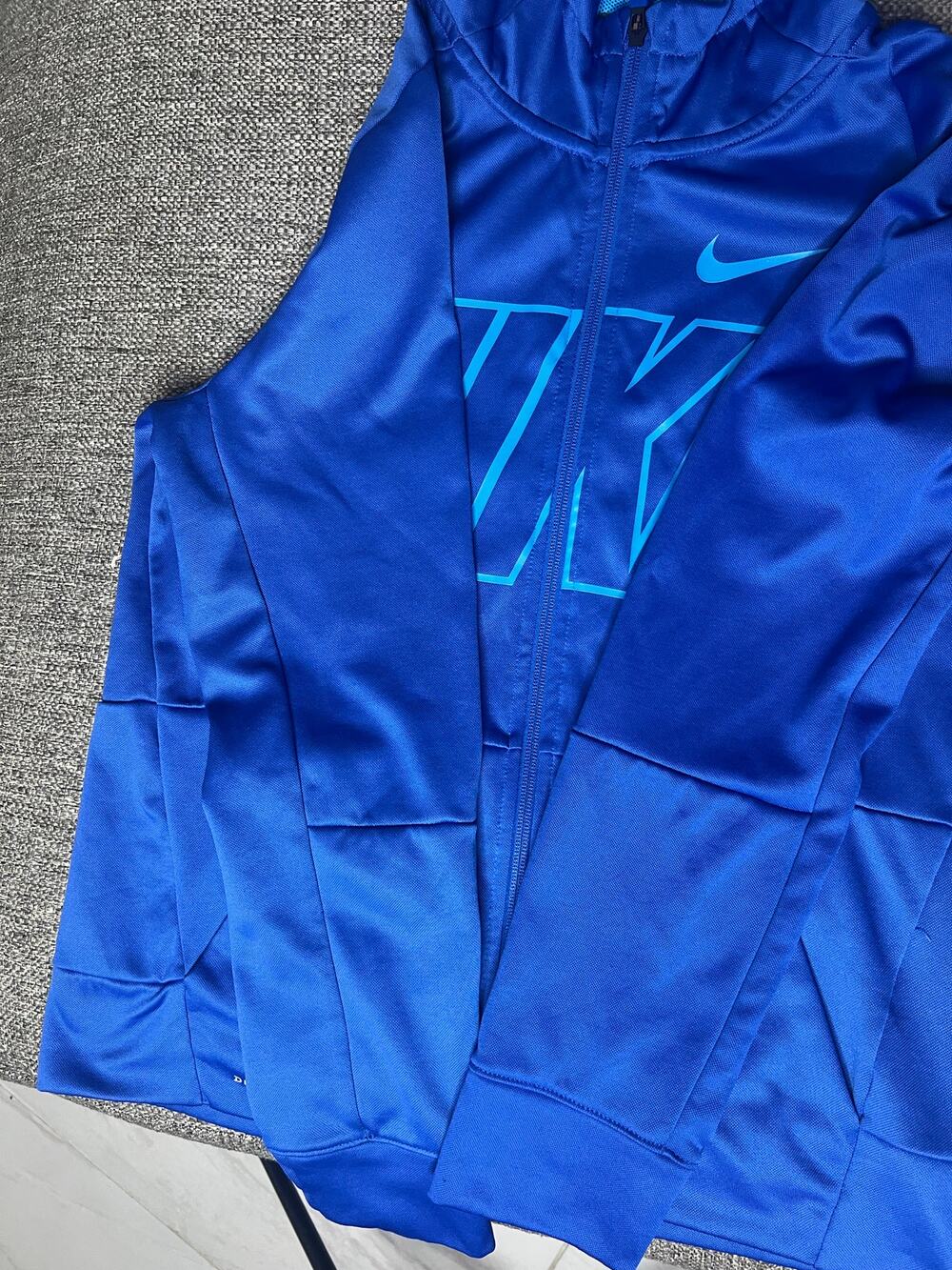 Nike Kids XL blue Jacket with hoodie. Used in good conditions